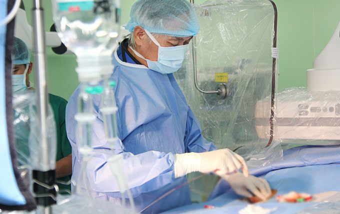 Doctor intervening for a patient with acute heart attack.