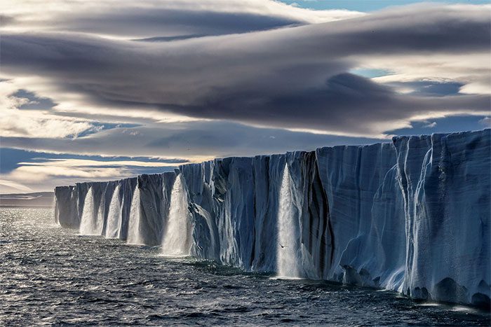 The global impact of melting glaciers on humanity is profound.