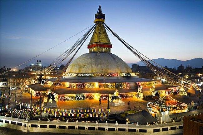 Panorama of Boudhanath Stupa at night.