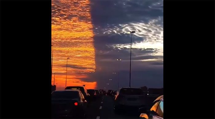 The sky is neatly split in half, vertically.
