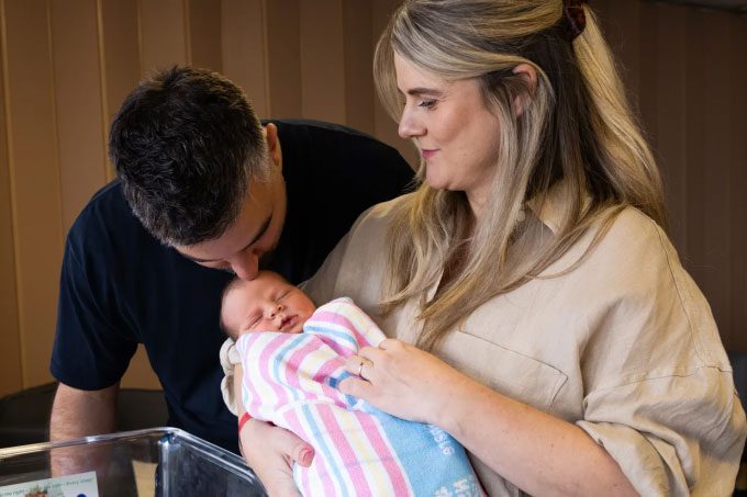 Baby Bonnie with her parents.