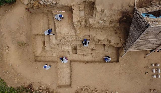 Archaeologists working on the ancient wall over 4,000 years old.