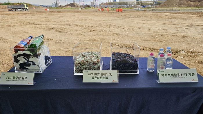 Stages of transforming PET plastic waste into new plastic bottles