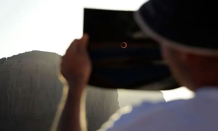 It is unsafe to look directly at the bright Sun without using eye protection.