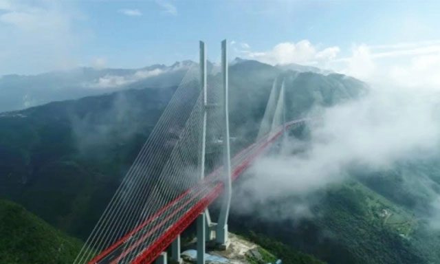The Beipan River Bridge stands approximately 565 m above the river surface.