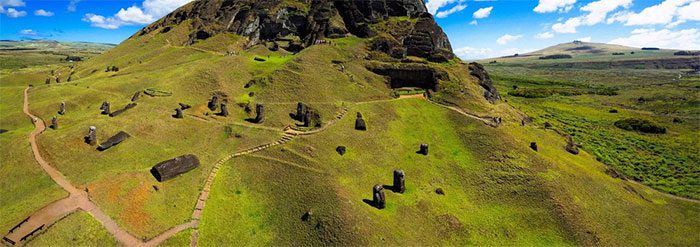 Moai statues standing along the road network.
