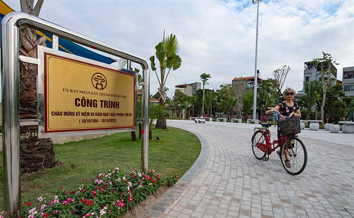 Mrs. Nguyen Thi Kim Ngan cycling around Ngoc Thuy Park