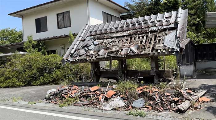 Many houses and structures have yet to be rebuilt.