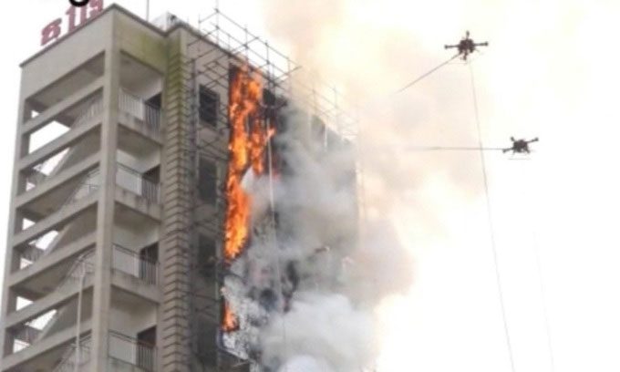 Drone practicing extinguishing fire in a skyscraper.