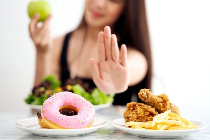 Limit sugar intake to less than 10% of daily caloric intake