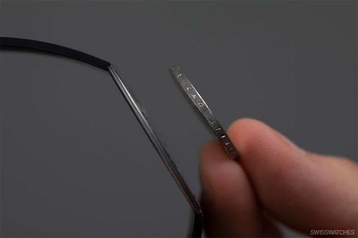 Comparison of the thickness of the Richard Mille RM UP-01 Ferrari watch (left) and a 2 euro coin