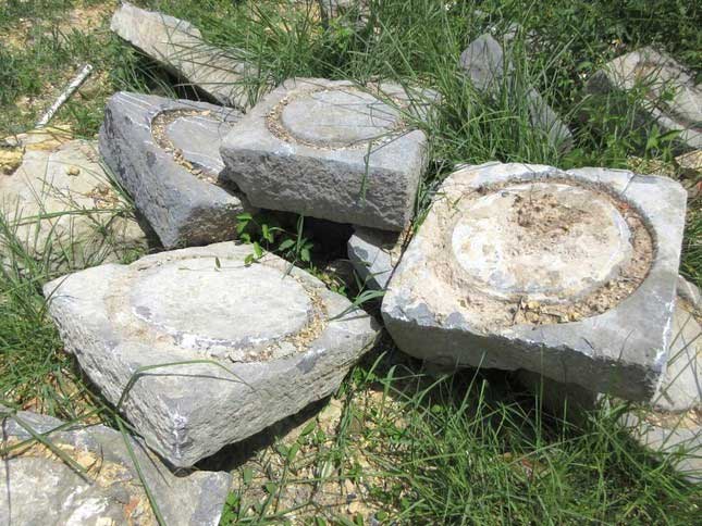 16 ancient stone bases discovered during the temple restoration.