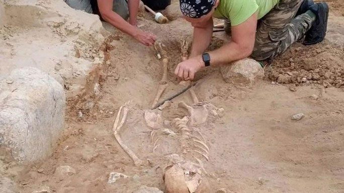Vampire child skeleton at Pień village cemetery