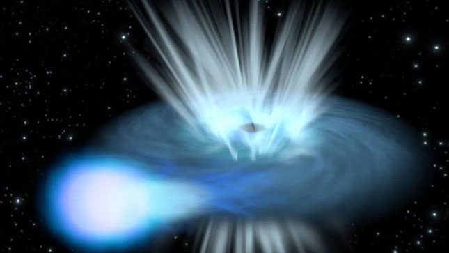 An illustration of a black hole destroying a nearby star.