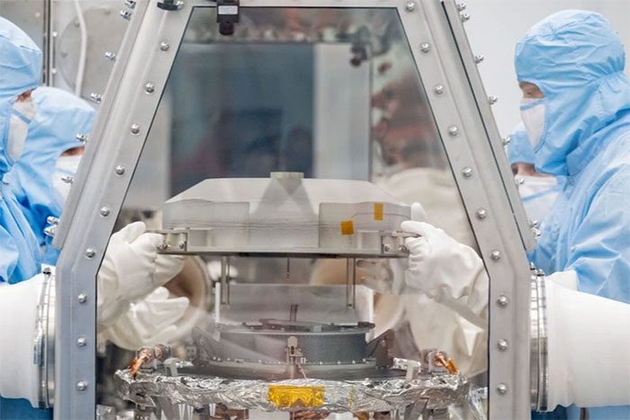 NASA experts opening the asteroid sample container on September 27.