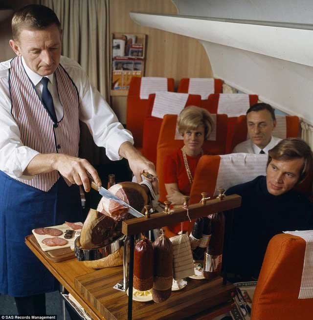 Passengers being served Iberico ham – one of the world's most expensive dishes