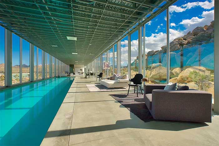 The house features an indoor pool stretching nearly half the length of the home.