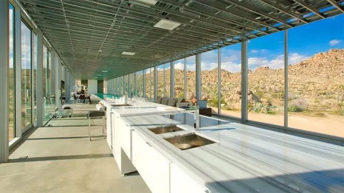 The kitchen features a marble countertop