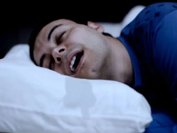 Drooling while sleeping can lead to dry mouth and throat.