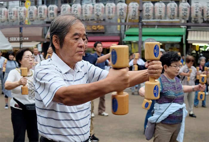 Senior citizens exercising in Tokyo, Japan.