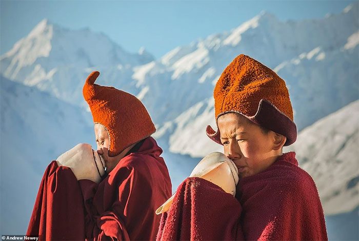Every early morning, two young monks blow conch shells and call for prayers.