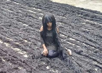 nigerian woman sets guinness world record with hair longer than 350m 131248