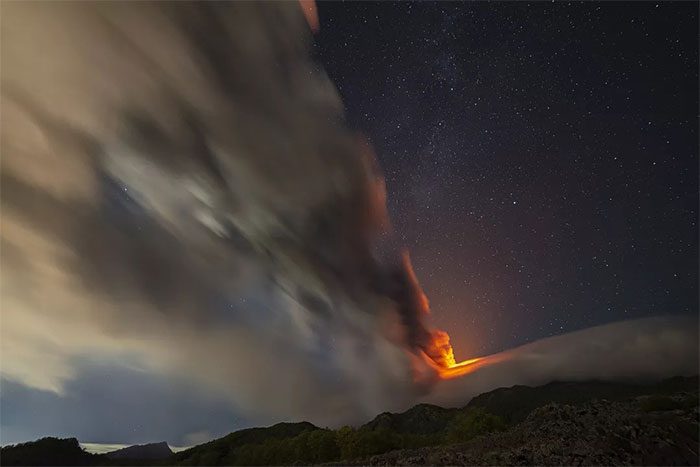 Smoke column generated by Mount Etna viewed from the village of Sant'Alfio, northern Sicily.