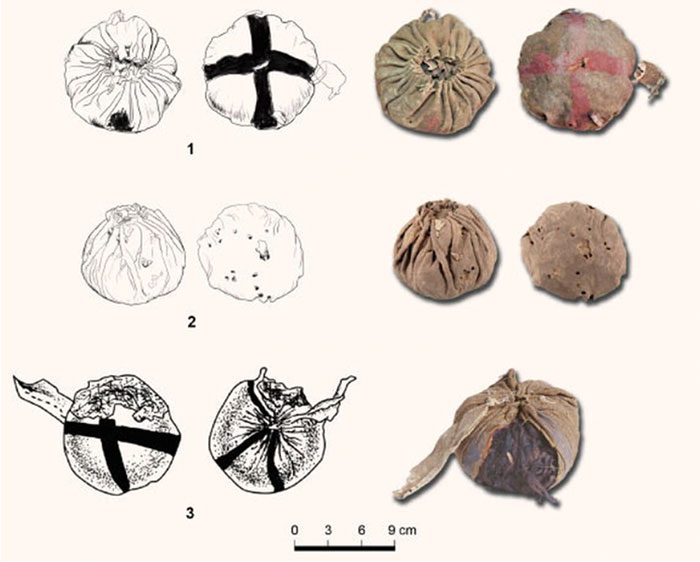 The strange leather spheres discovered by archaeologists in three ancient tombs.
