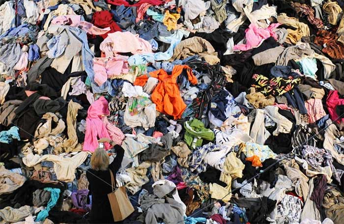 30 tons of discarded clothing displayed at the Park Avenue Armory in New York City