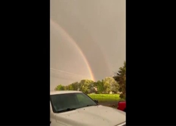 rare sight of rainbow and sunset appearing in the sky 129567