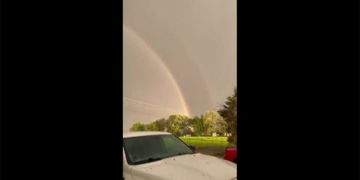 rare sight of rainbow and sunset appearing in the sky 129567