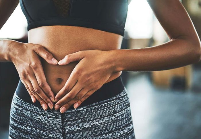 An infected belly button has a foul smell and appears red, inflamed, and warm to the touch.