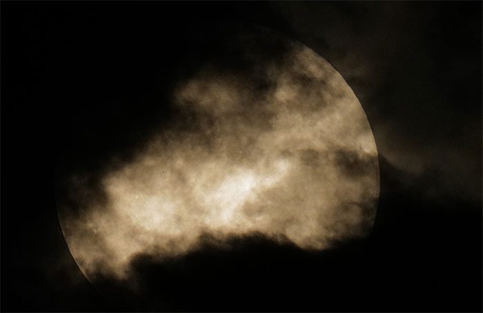 In Ha Dong, the moon gently emerged after thick dark clouds at 9 PM.