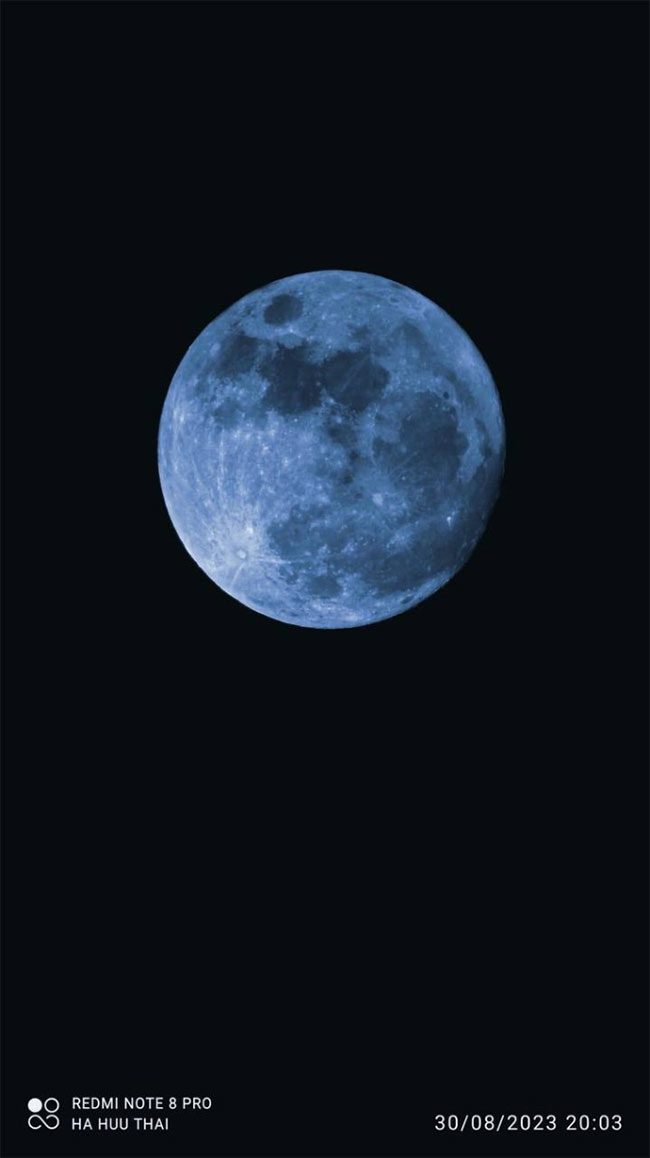 The "magnificent" supermoon radiates across the sky.