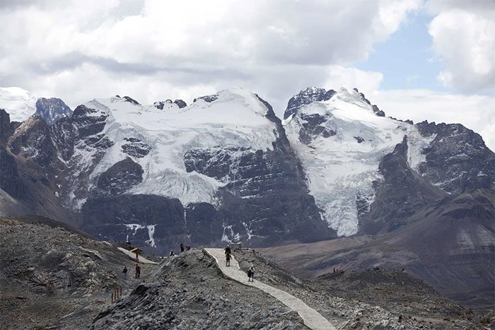 Tourists walking on the Tuco Glacier in Huascaran National Park