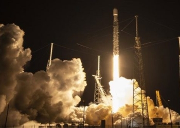 spacex sets record launching rocket into orbit 129681