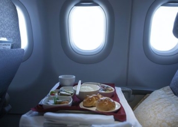 strange airline serving from economy to business class crew still brings rice for this reason 130567