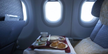 strange airline serving from economy to business class crew still brings rice for this reason 130567