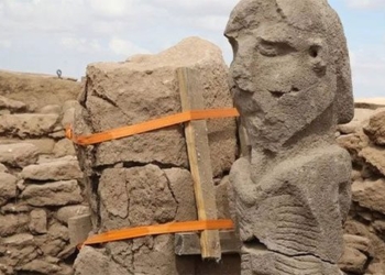 the mystery of the giant mans impassive face 130556