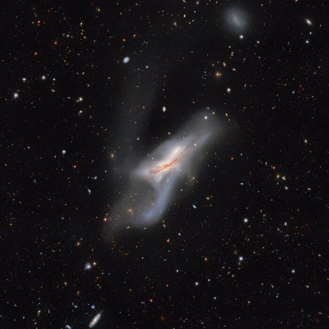 Image of two galaxies merging that began over 300 million years ago, according to SGA.