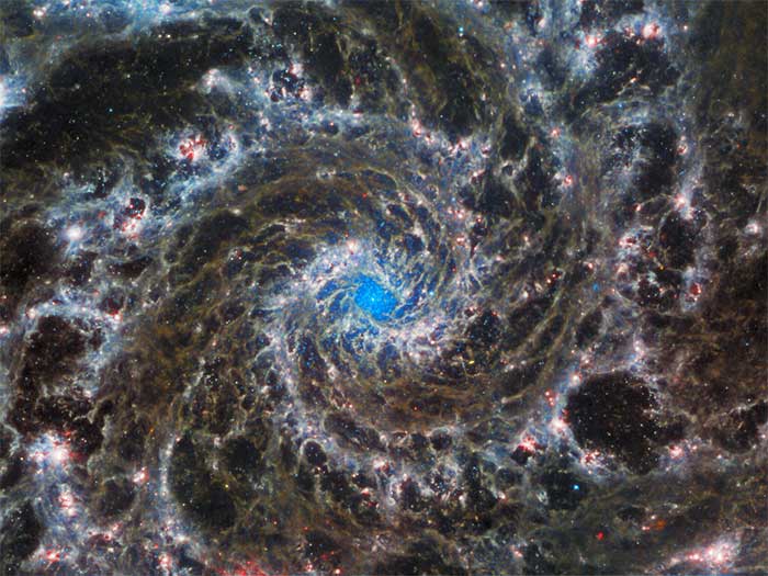 Image captured by the James Webb Space Telescope showing the center of galaxy M74