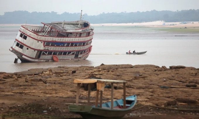 Boat stranded on the Rio Negro river, a tributary of the Amazon River.