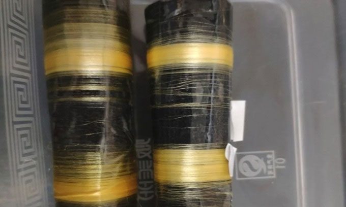 Spider silk produced by genetically modified silkworms.