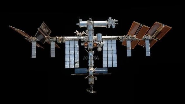 An image mosaic of the International Space Station taken by the Crew Dragon spacecraft in 2021.