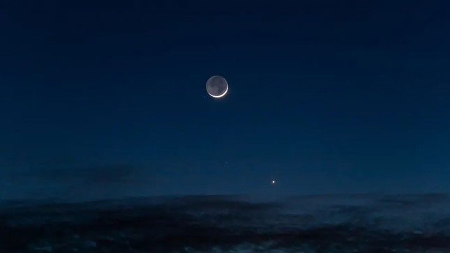 The crescent moon will move close to Venus this week.