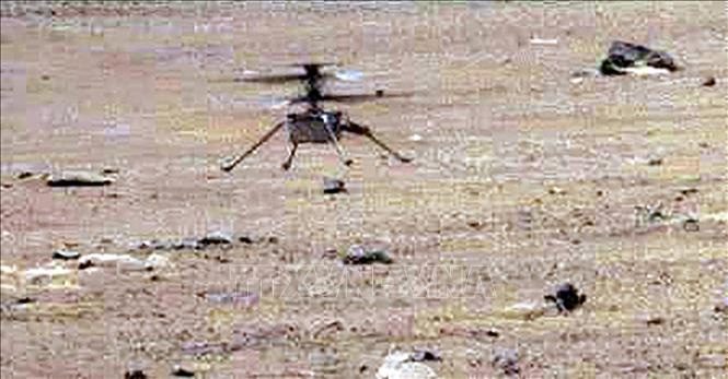 NASA's Ingenuity helicopter landing on the surface of Mars on May 7, 2021.