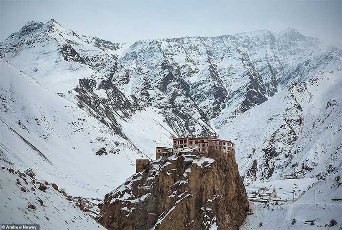 A beautiful photo showing Bardan Monastery perched on a cliff.
