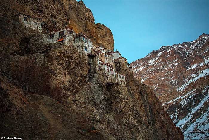 Phugtal Monastery at sunset.
