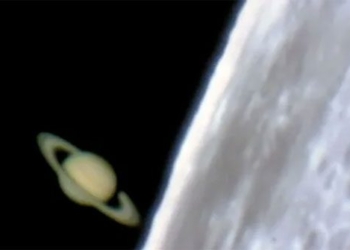 video moment saw wood growing from behind the moon 129759