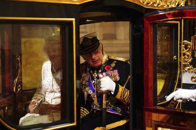 King Charles III and Queen Camilla arrive at Parliament on November 7.